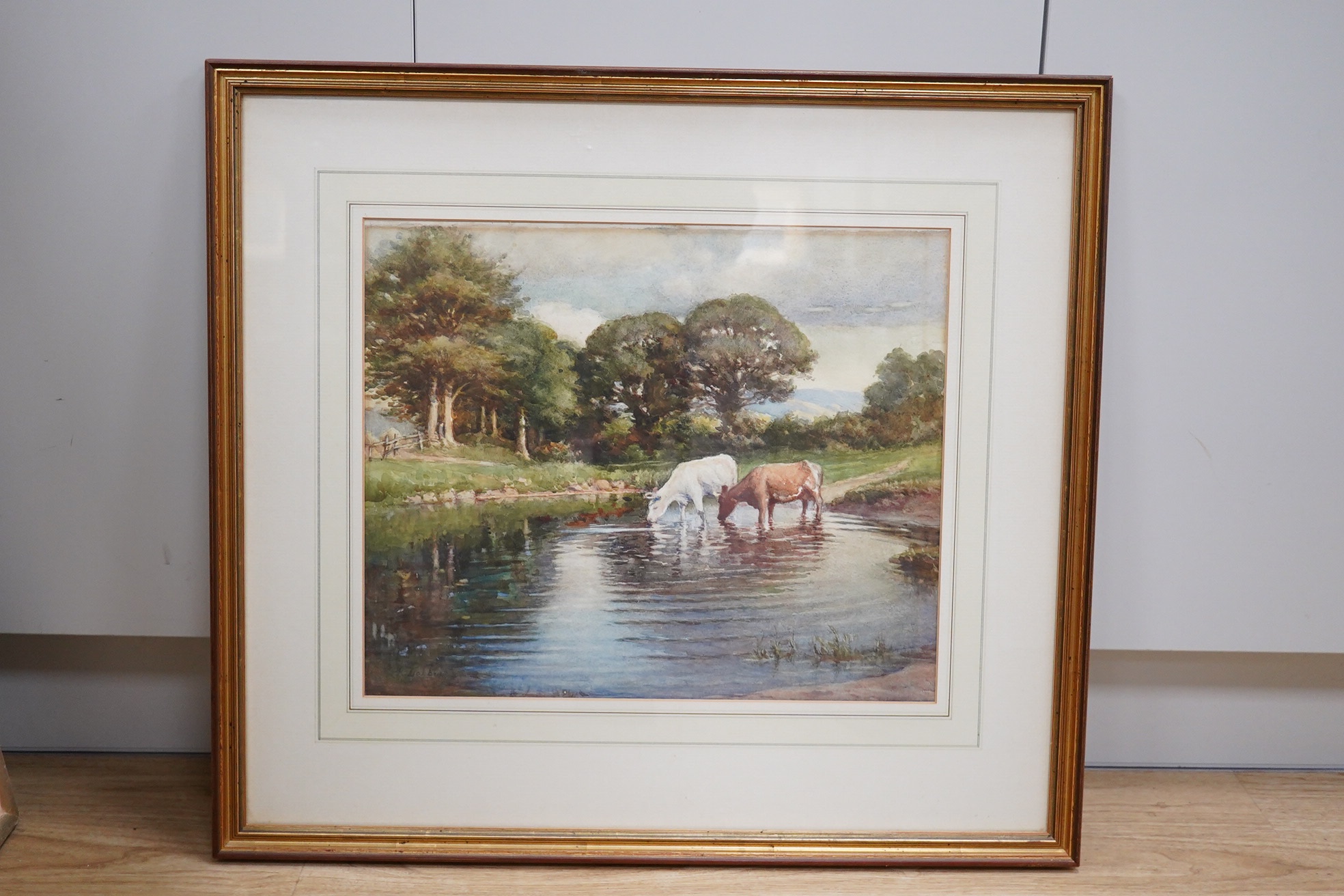 Kate Dobbin (Irish, 1868-1955), watercolour, Cattle watering, signed, 38 x 46cm. Condition - poor to fair